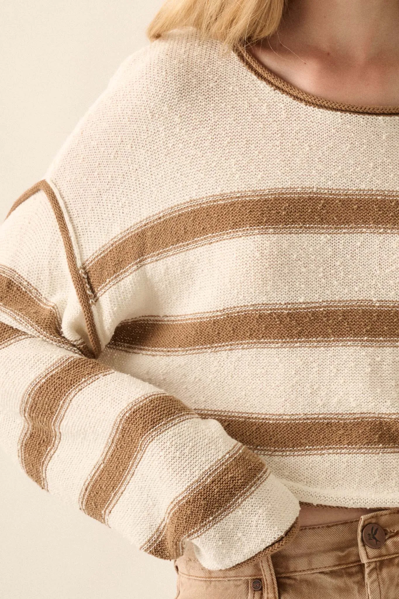 Believe the Stripe Exposed-Seam Cropped Sweater